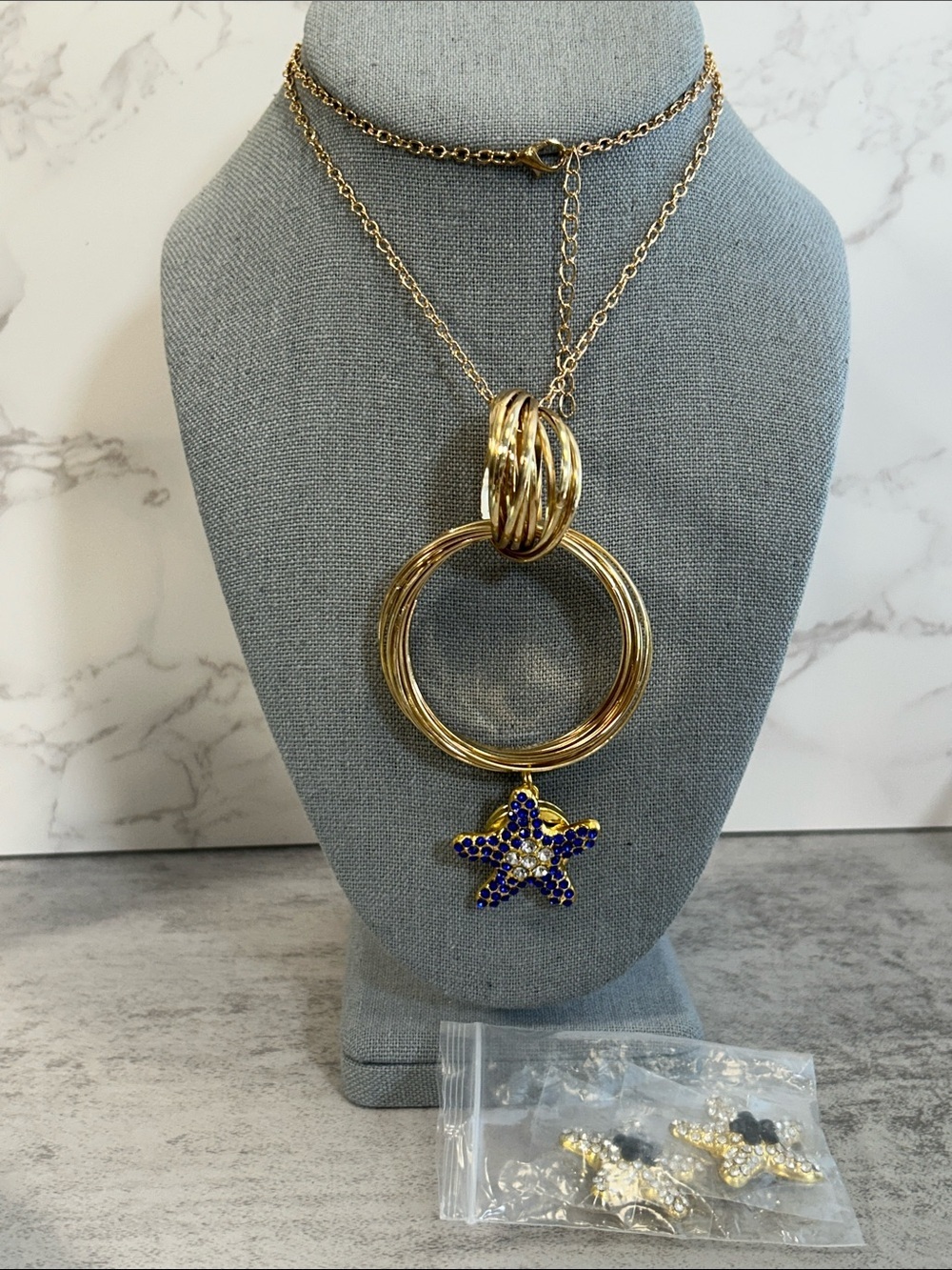 Gold Starfish Snap Pendant Necklace with Blue Crystal Accents